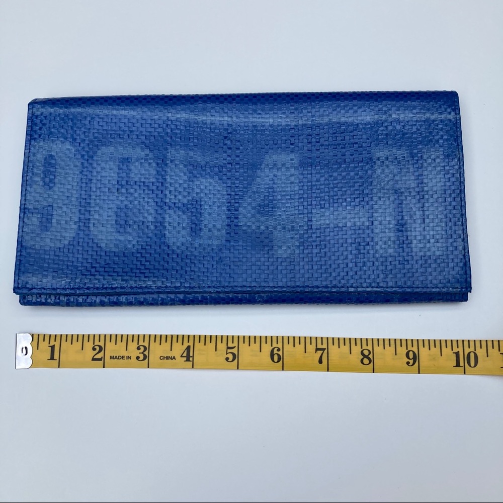 Clutch hand made in Cambodia -recycled materials.
